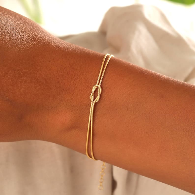 Minimalist Love Knot Bracelet – Waterproof Stainless Steel Unisex Accessory