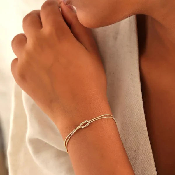 Minimalist Love Knot Bracelet – Waterproof Stainless Steel Unisex Accessory