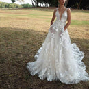 Women's V-Neck Sleeveless Lace Flowing Wedding Gown – Elegant Bridal Dress