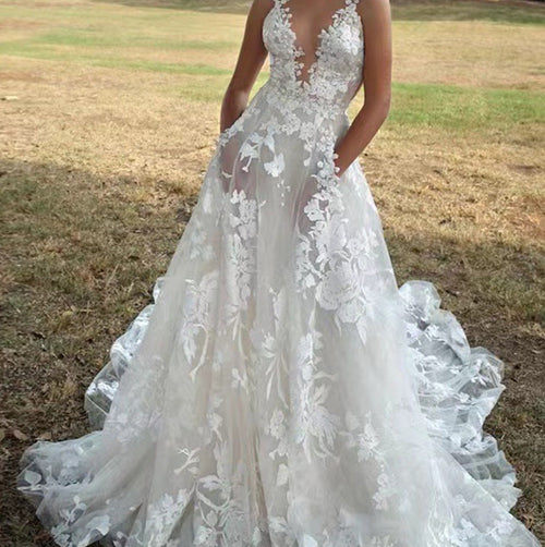 Women's V-Neck Sleeveless Lace Flowing Wedding Gown – Elegant Bridal Dress