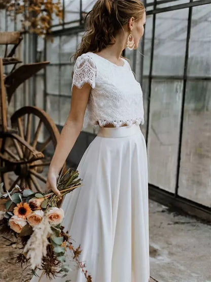 Women’s White Two-Piece Bridal Gown – Elegant Lace Top and Flowing Maxi Skirt