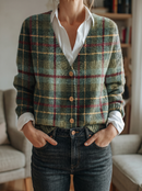 Green plaid knit cardigan front hands in pockets